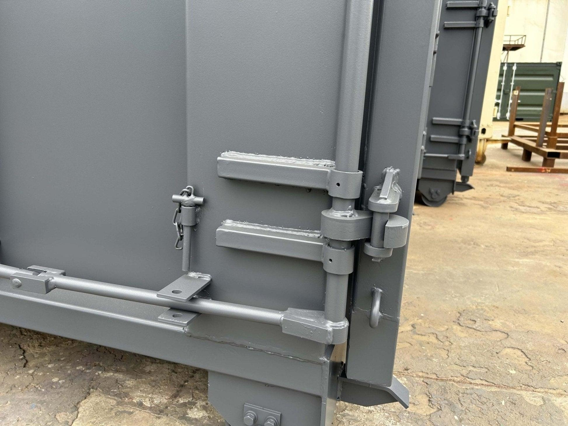 Handyman repairing door handle with screwdriver during home maintenance